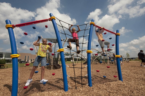 Climbing wall with rope climber